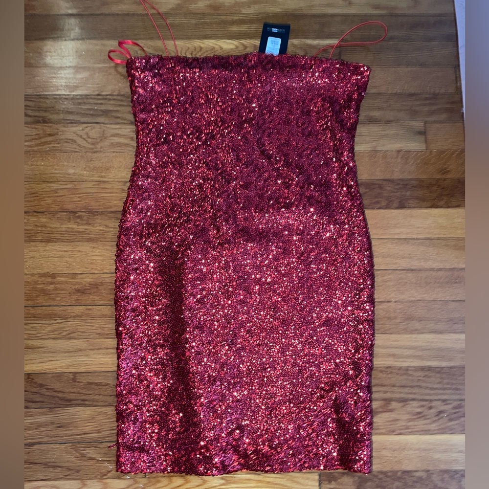 Sequin dress, silky inside, never worn, no holes , no tears, non smoking home